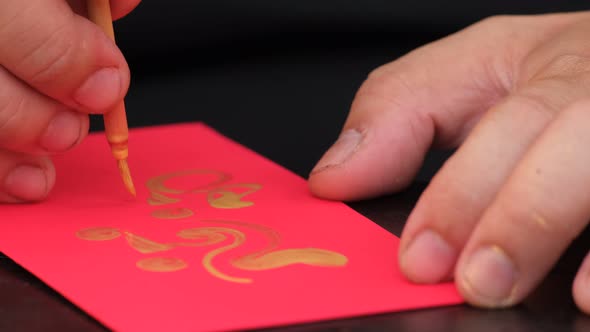 Vietnamese scholar writing calligraphy on the red envelope, ang pao in the lunar new year alt