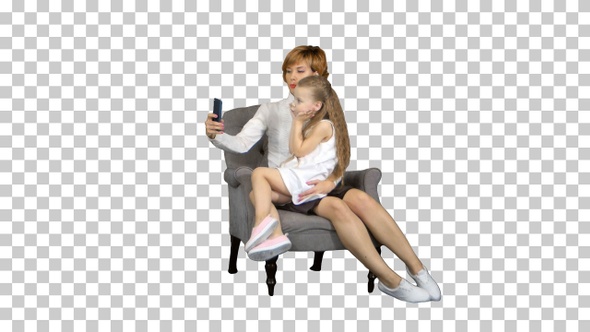 Little girl and her mother taking selfie, Alpha Channel