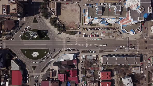 Round Road Junction in the Center of Krasnodar, Russia. Day Active City Traffic Cars alt