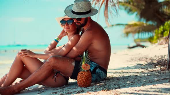 Couple Tropical Island Honeymoon Leisure.Couple Traveler Relaxing Enjoying In Tropical Resort. alt