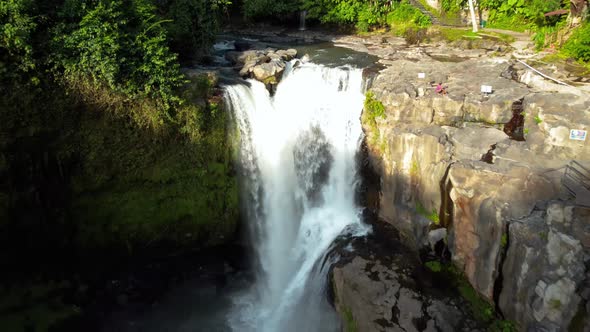 Epic Tegenungan Waterfall Aerial Bacward alt