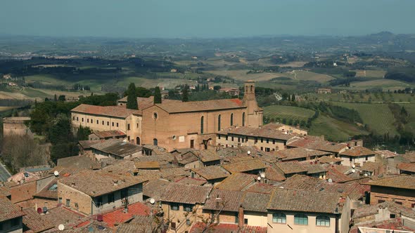View of San Gimignano with Church of St Augustine, Tuscany, Italy