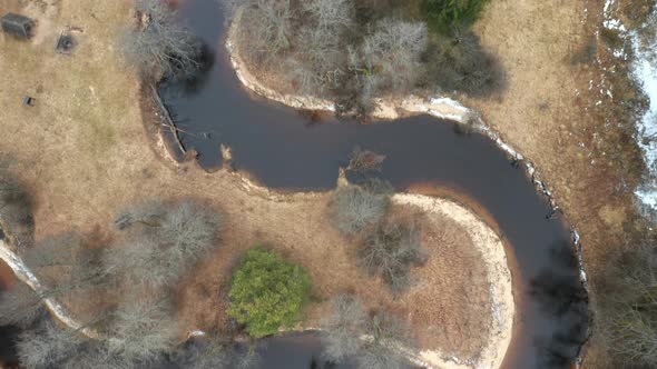 AERIAL: Curves of Calm River in National Park in Lithuania
