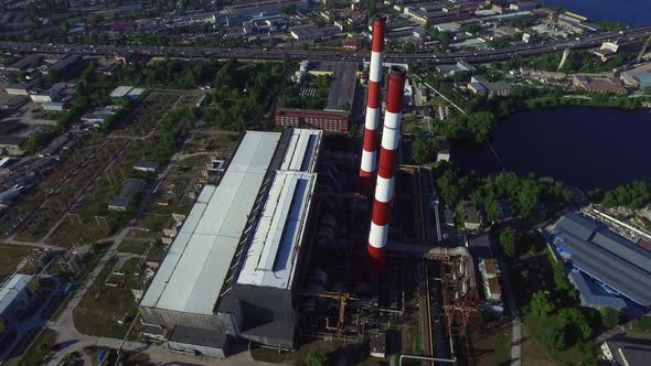 Industrial Chimney Power Plant in Modern City. Drone View Pipe Water Power Plant alt