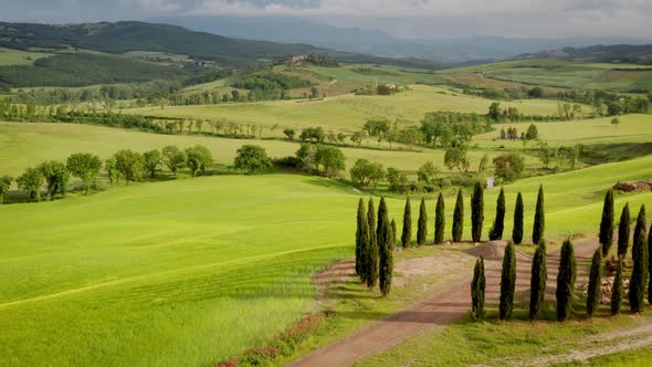 Flying over the amazing rolling hills of Tuscany Italy alt
