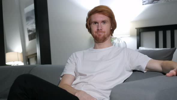 Yes, Redhead Man Shaking Head to Agree alt