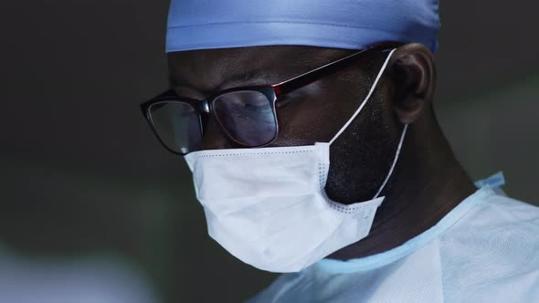 African American surgeon in operating room