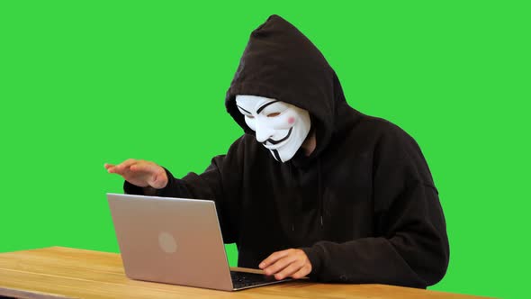 Online Hacktivist Hacker Finish Coding Virus Software Program for Web Fraud Attack on Business Data