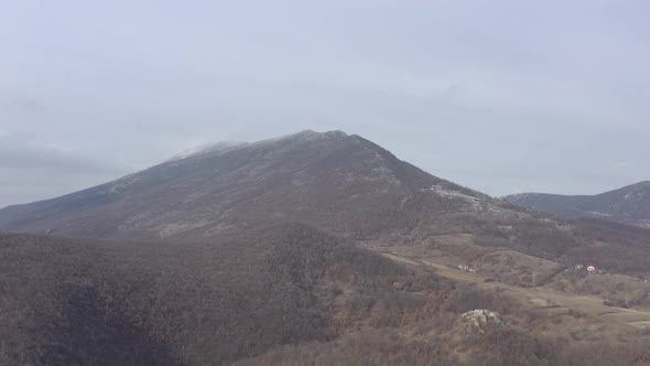 Winter scene of Veliki Krsh mountain ranges 4K aerial video