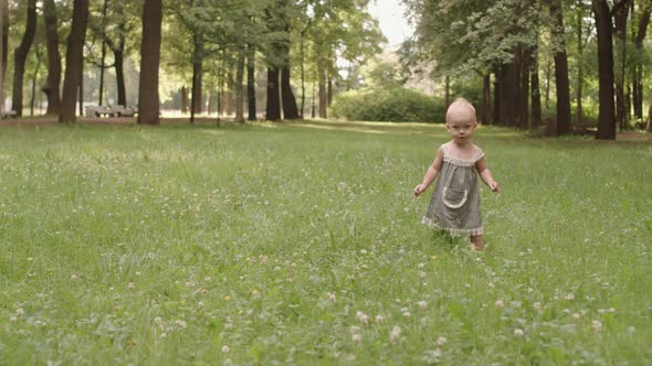 Toddler Girl Having Fun in Park alt