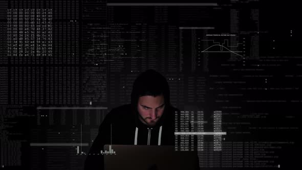 Black hooded hacker in midst of computer code is frantically typing on keyboard of his system and in alt