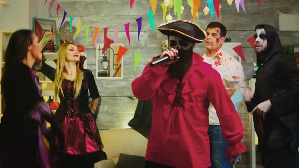 Bearded Pirate Singing Karaoke at Halloween Party alt