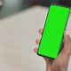 Close Up of Young African Man Using Smartphone with Green Screen - VideoHive Item for Sale