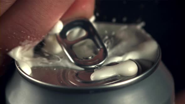Super Slow Motion From the Tin with Beer Pours Foam with Spray alt