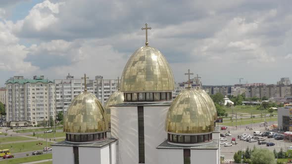 Dome of the Church Aerial View Traditional Old Church in Lviv Ukraine City Cloudy Blue Sky alt