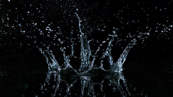 Super Slow Motion Shot of Water Crown Splash at 1000Fps Isolated on Black Background alt
