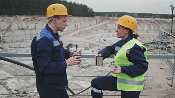 Quarry Workers Chatting on Break alt