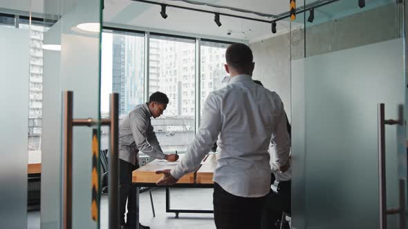 Back View Leader Man Opening Door to Office Boss Caught Idle Multiracial Employees By Surprise alt
