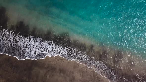 Top View of a Deserted Black Volcanic Beach alt