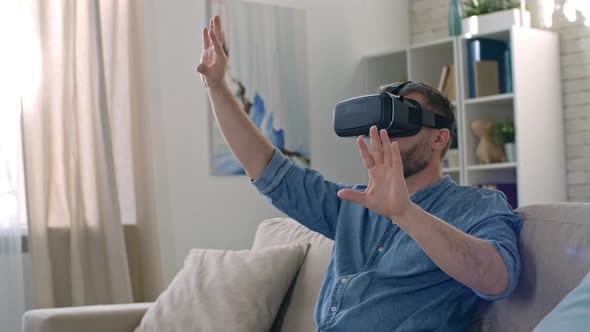 Man in VR Goggles Working alt