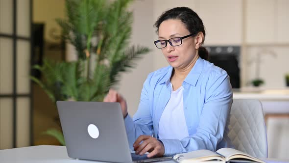 Tired Overworked Sad Mixed Race Mature Woman Wearing Glasses Freelance Secretary or Manager Took a alt