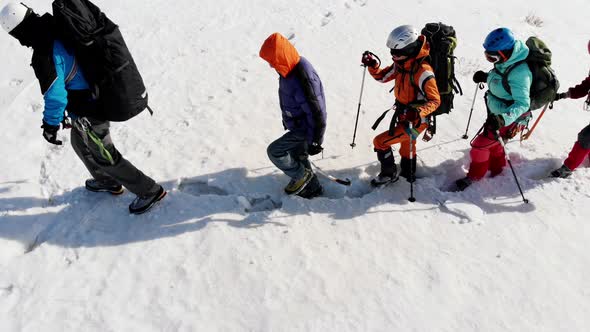 the Span of the Camera Shows As One Long Line Going Travelers. They Have a Lot of Equipment, but the alt