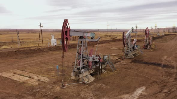 Pump Jack in Vast Oil Fields in Russia alt
