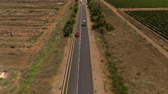 New road paving pressed by a road roller, Top down aerial view. alt