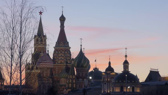 Saint Basil Cathedral and Tower of Kremlin in Moscow in Dusk Time Russia
