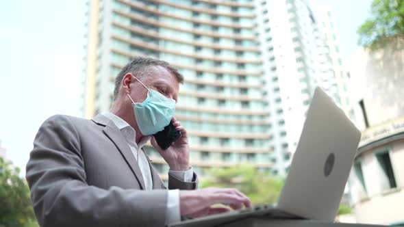 businessman wearing a surgical face mask during protect coronavirus covid-19 virus pandemic alt