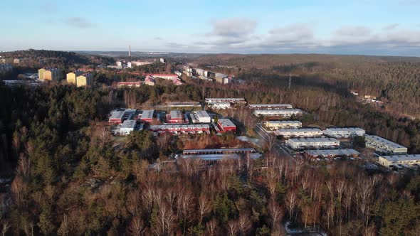 Nordic Neighborhood with Attached Residential Houses in Forest Aerial