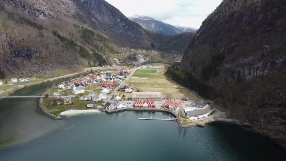 Norways richest municipality Modalen - Aerial approaching town centre from the sea alt