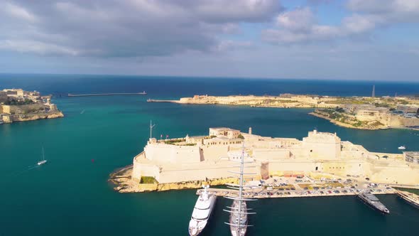 The view of Grand Harbour and Senglea (L-isla) peninsula with Fort Saint Michael on the tip from the alt