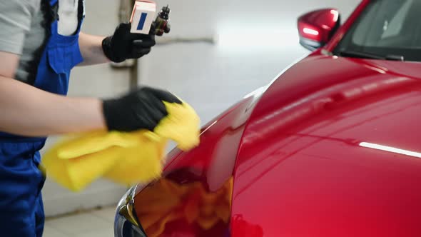 Manual Car Wash a Man Washes the Car From a Special Hose