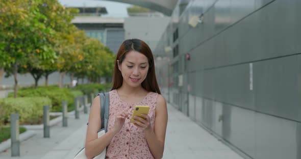 Woman use of smart phone at outdoor