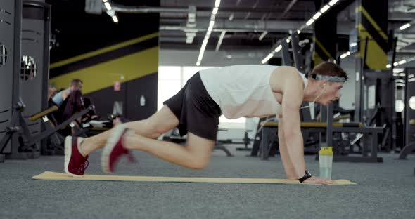 Sportsmen Doing Exercise on His Feet