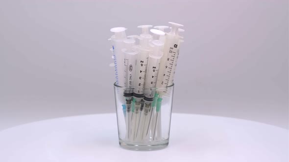 Disposable medical syringes