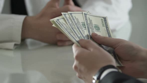 Businessman Giving Money to Medical Scientist for Vaccines Purchase, Donation alt