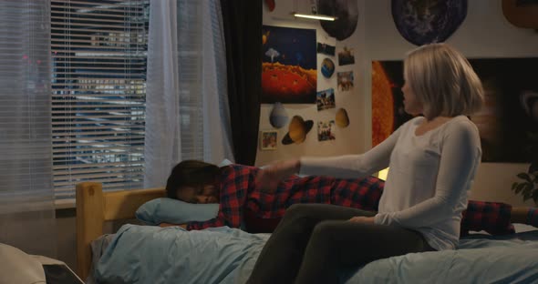 Daughter and Mother Together at Bedside alt