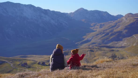 Family of Tourists Visits the Sedlo Pass Bobov Kuk in the Mountains of the Northern Montenegro alt
