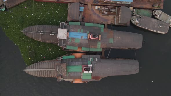 Aerial drone vertical view of two rocket paddle steamers statics in the waters of Dhaka, Bangladesh alt