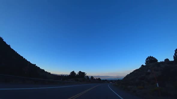 Driving on route 395, near mono lake and lee vining, in California, USA. alt