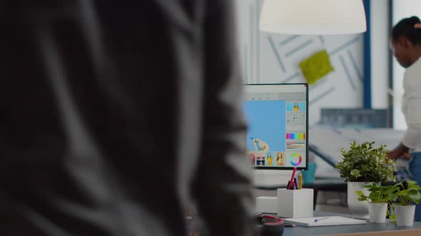 Woman Retoucher Looking at Camera Smiling Working in Creative Media Agency alt