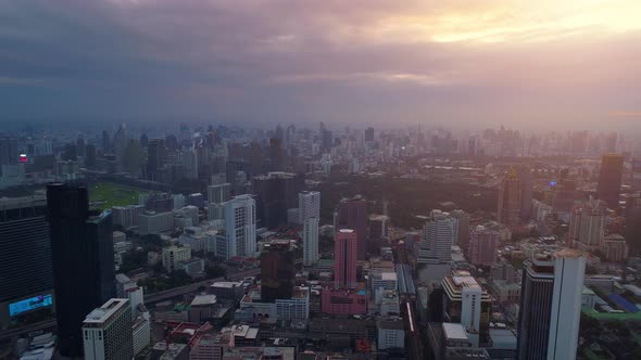 4k Aerial city view of Bangkok dowtnown, Flying over Bangkok, Thailand. alt