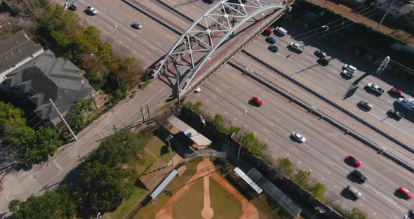 Aerial of cars on 59 South freeway in Houston, Texas on a bright sunny day alt