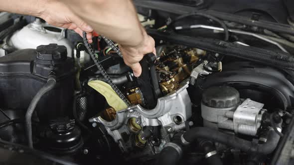 Car Mechanic Repair the Engine in Car Service
