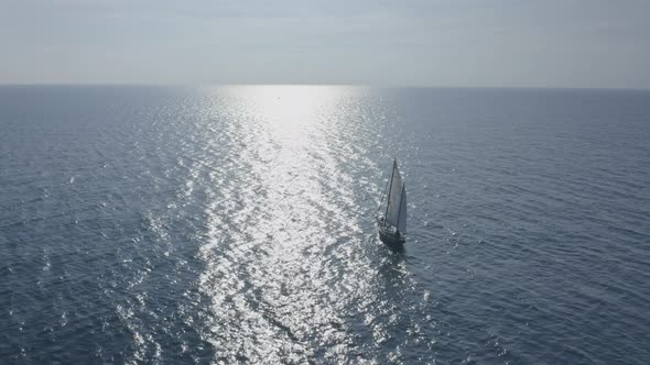 Sailboat sailing the sea in the morning