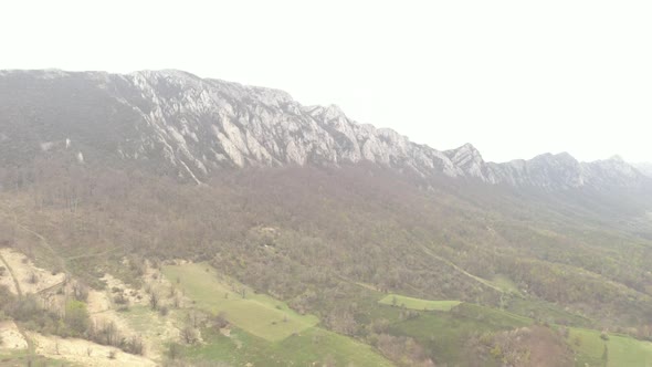 Mountain Velik Krsh in Eastern Serbia by fogy morning 4K drone video alt