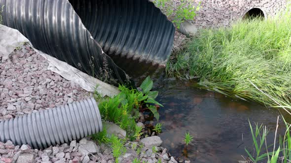Close-up view of sewage flowing out of a pipe. Sweden.