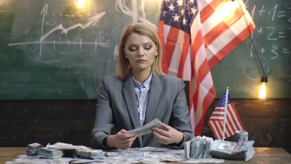 American Businesswoman with Money. Woman Holding Dollars. Credit alt